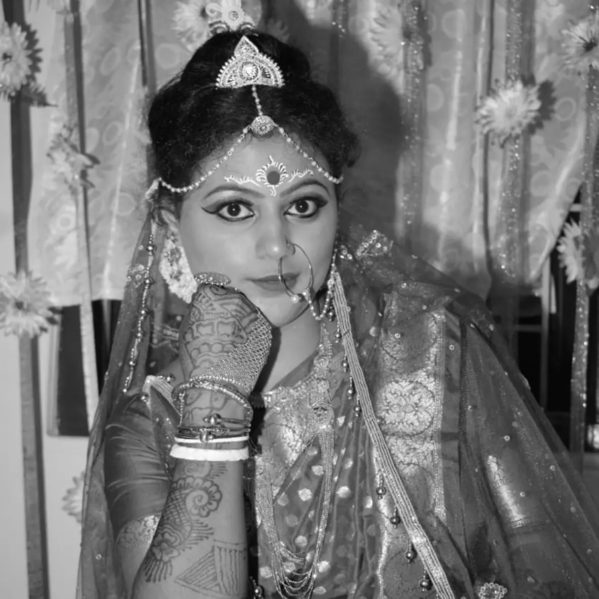 black & white image of a girl posing for marriage photo