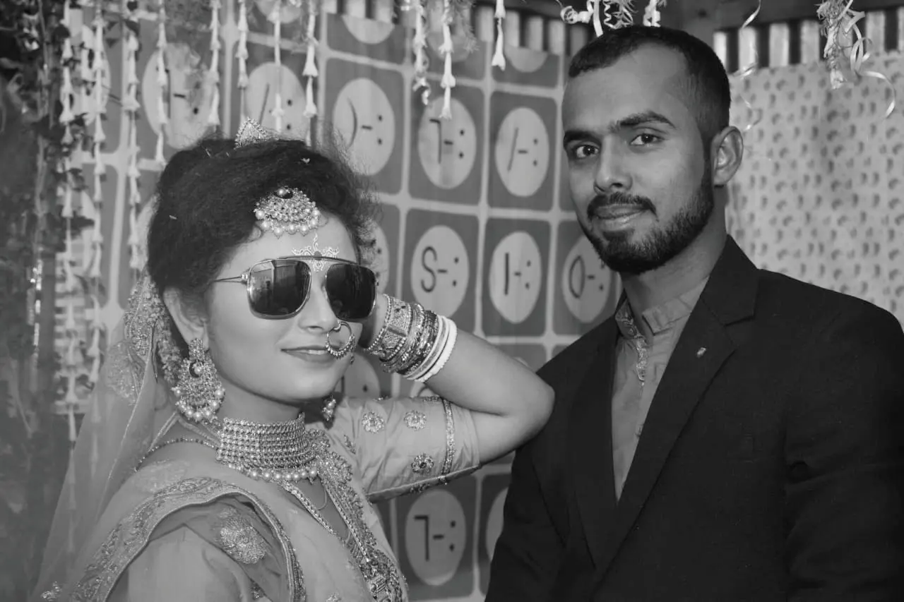 black & white image of a newly married couple
